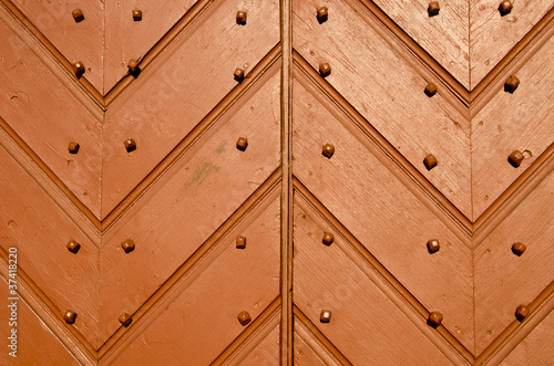Antique wooden doors closeup and details.