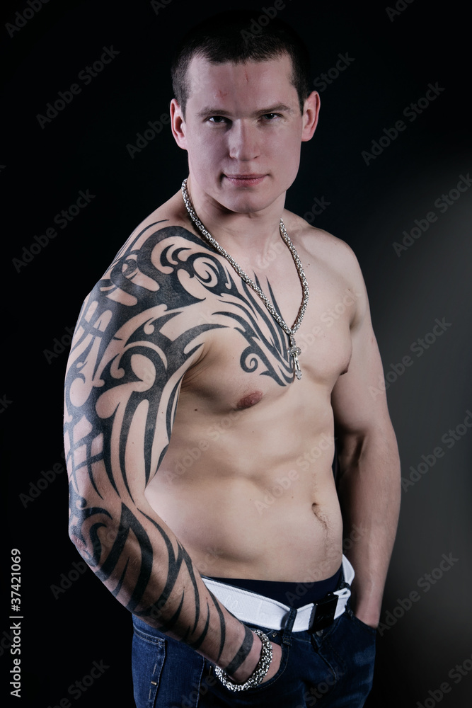 Fototapeta premium Muscular Sexy Man with tattoo