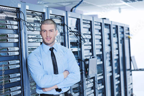 young it engeneer in datacenter server room