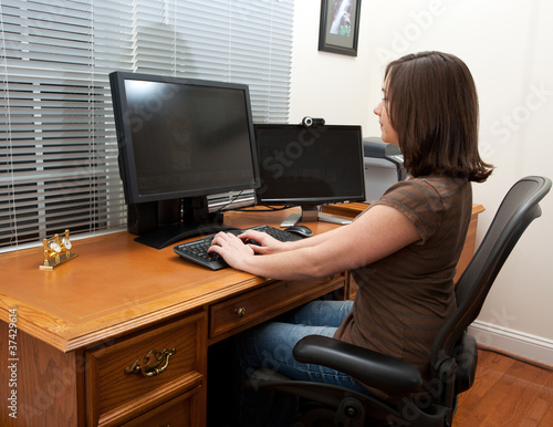 Woman at computer desk