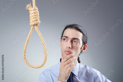Φωτογραφία Businessman committing suicide through hanging