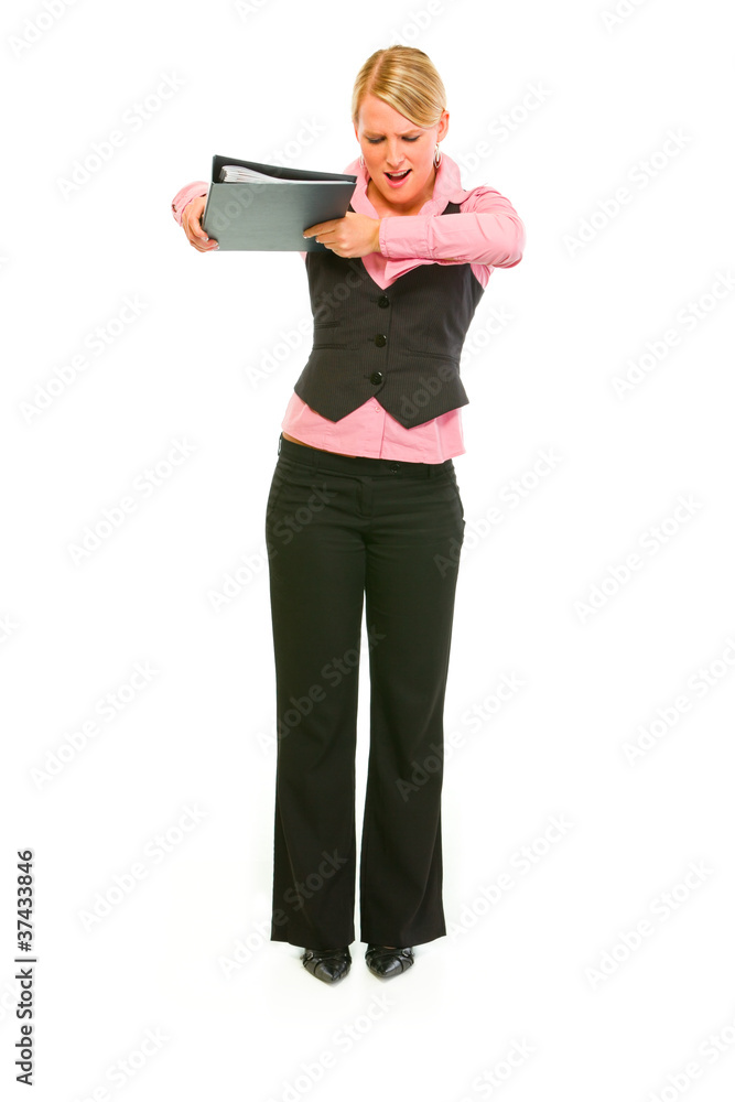 Angry female business secretary throwing folder Angry female business secretary throwing folder