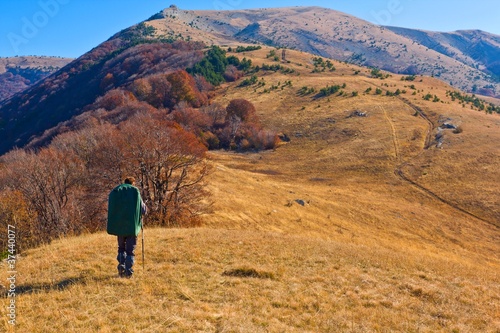 hiker in a autumn mountains