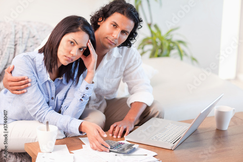 Couple having a hard time paying their bills