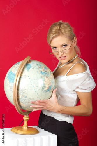 sexy woman teacher with globe