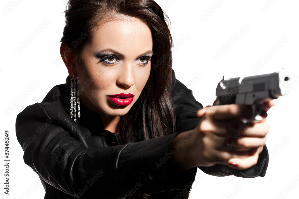 elegant fashionable woman with a pistol in hands elegant fashionable woman with a pistol in hands