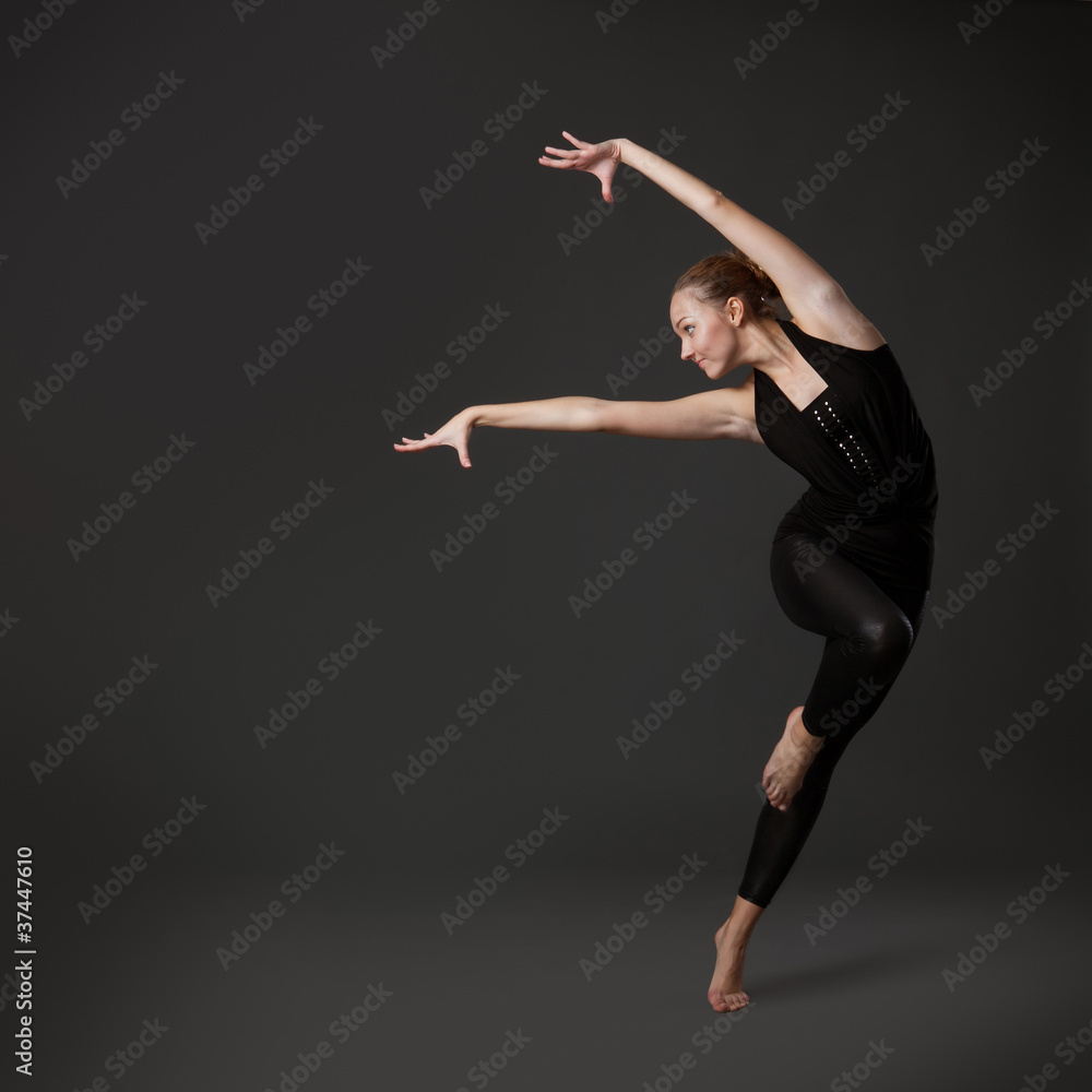Fototapeta premium attractive young woman dancing