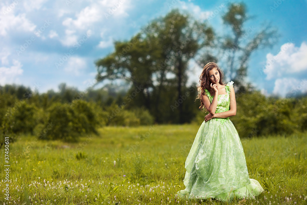 Portrait of a young beautiful woman on the nature Portrait of a young beautiful woman on the nature