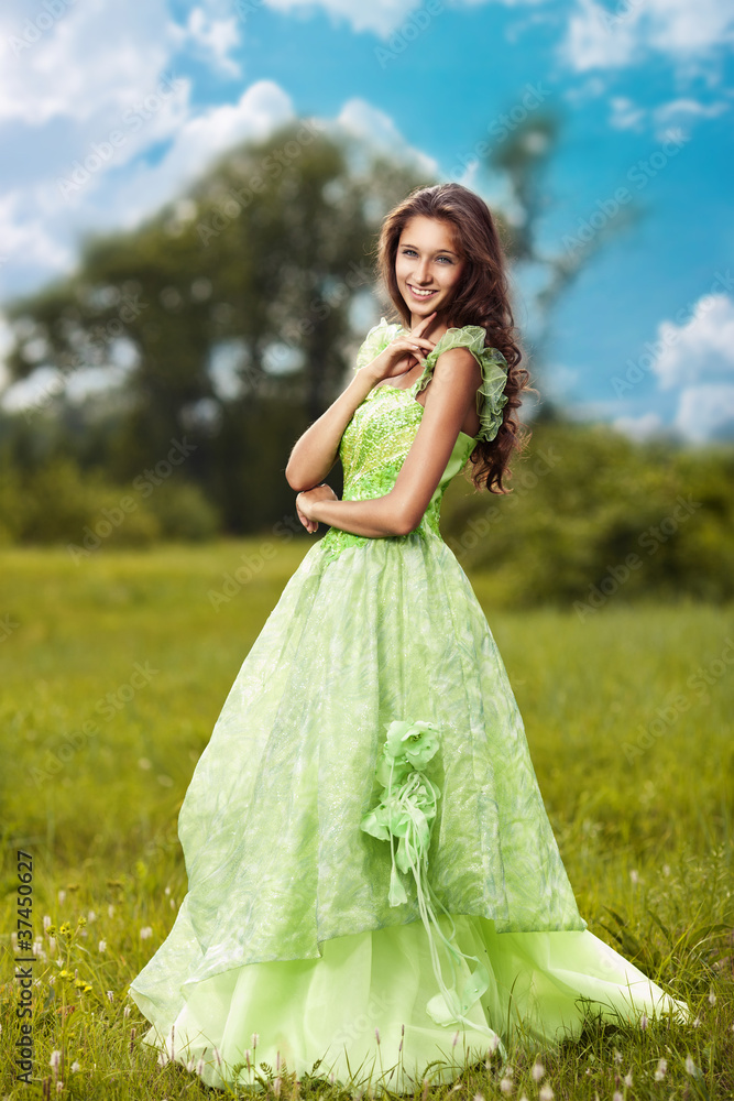 Portrait of a young beautiful woman on the nature Portrait of a young beautiful woman on the nature