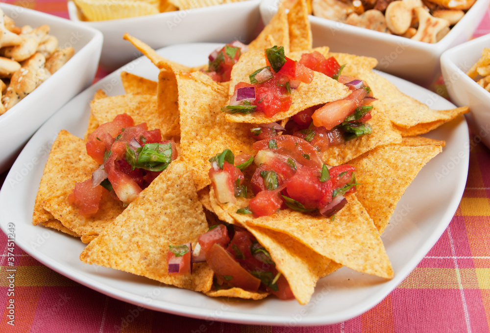 Nachos, corn chips with fresh salsa Nachos, corn chips with fresh salsa