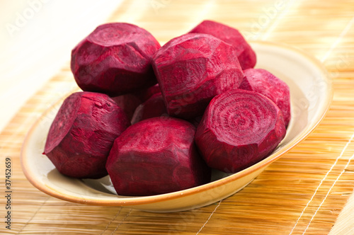 Stack of fresh beetroots on the plate