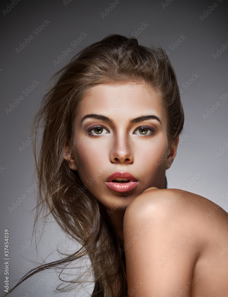 Beautiful woman with bright make up. On dark background. Beautiful woman with bright make up. On dark background.