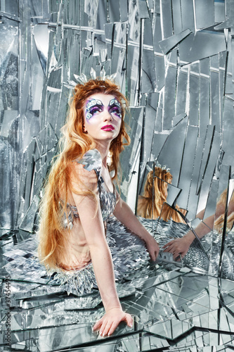 queen of the world behind the looking-glass