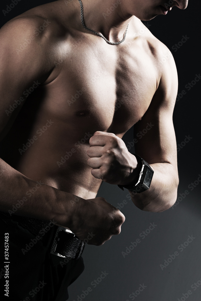 Naklejka premium Perfect naked male torso with a clock i
