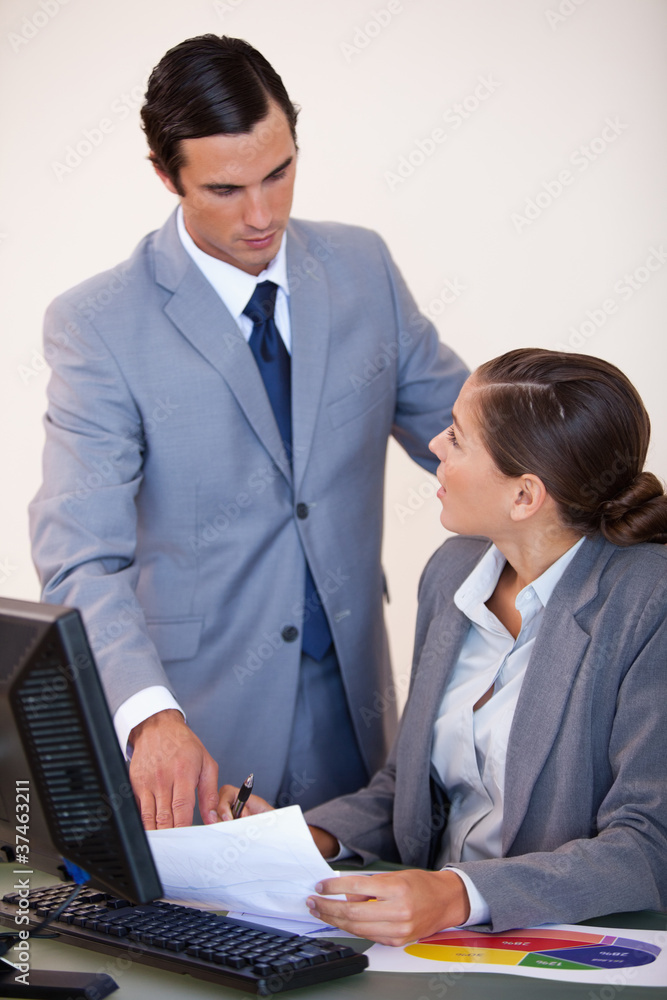Business people talking about paperwork Business people talking about paperwork