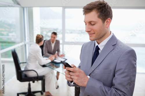 Wallpaper Mural Sales manager writing text message Torontodigital.ca