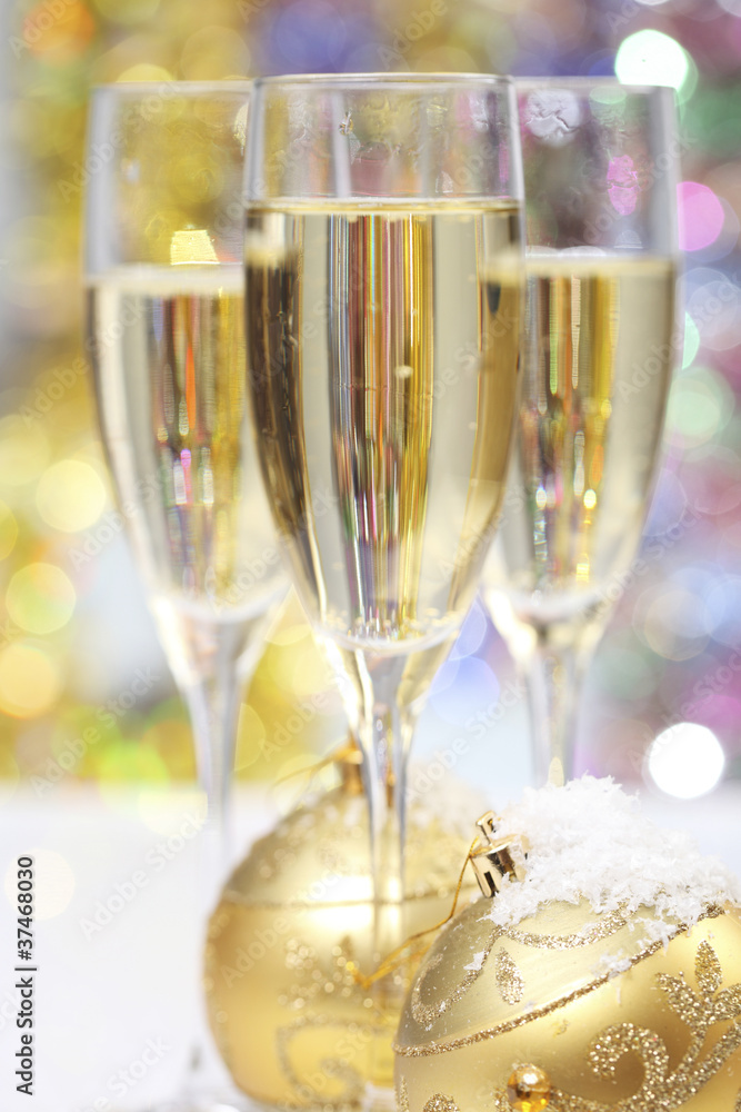 Champagne glass with Christmas ball (shallow dof Champagne glass with Christmas ball (shallow dof