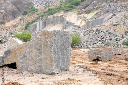 A granite block, product from granite quarry photo