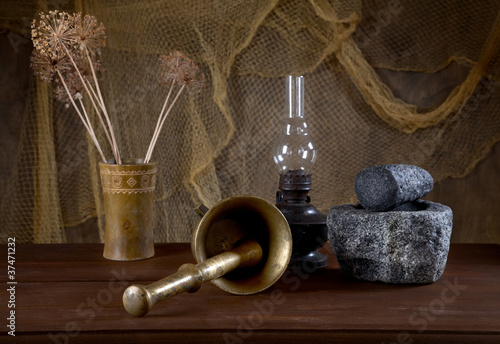 Bild auf Leinwand Still-life with mortars and an oil lamp