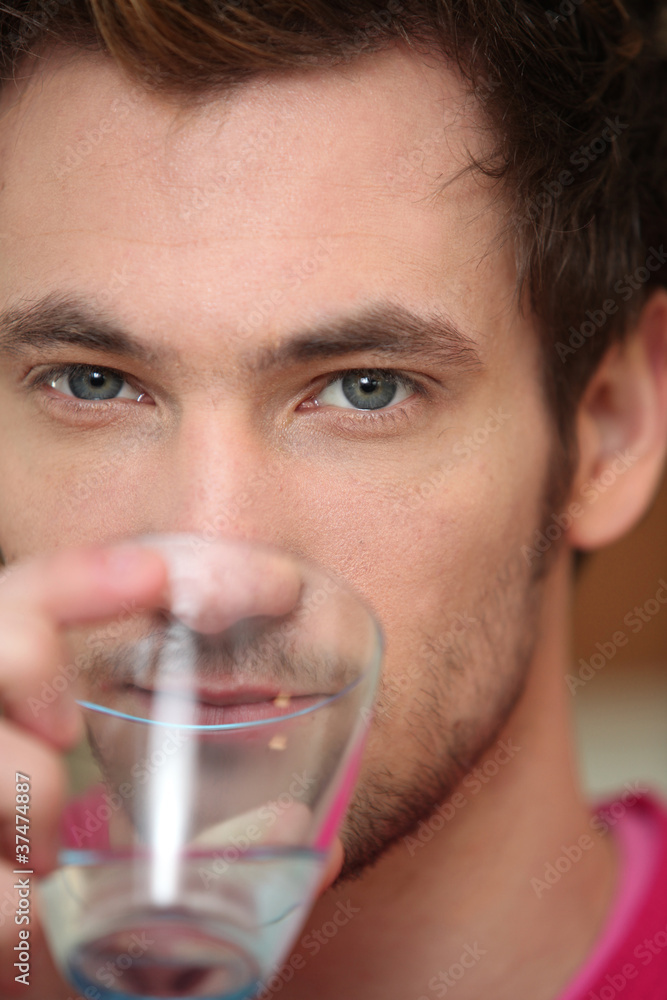 Man drinking water Man drinking water