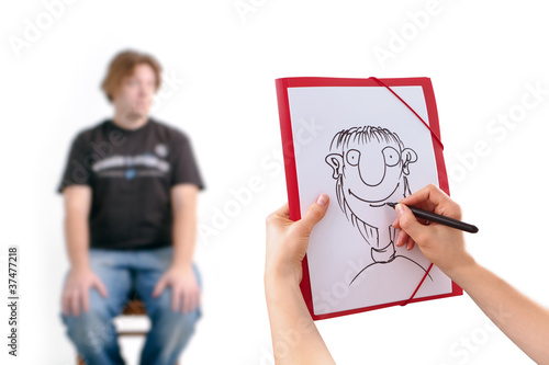 Human Hand drawing caricature of man