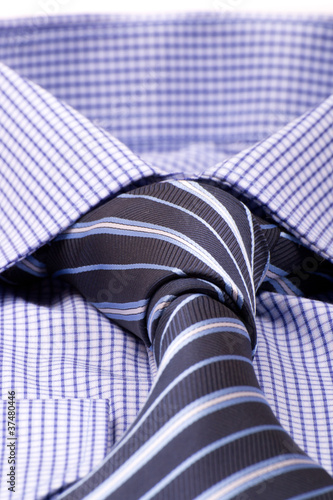 Blue shirt with a tie macro