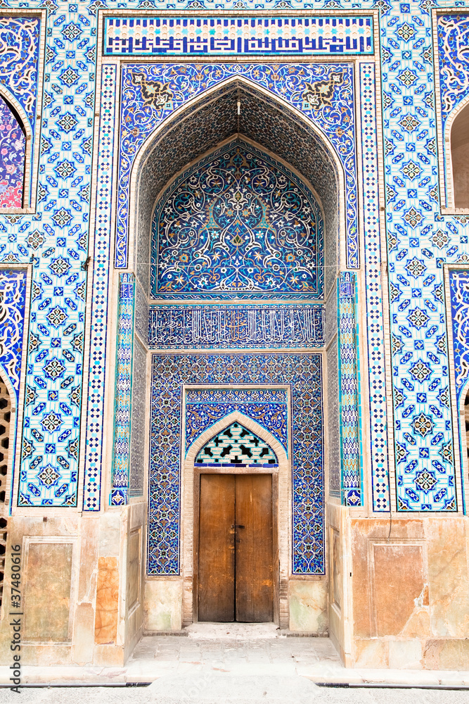 Tiled oriental Ateegh Jame mosque's wall , Esfahan, Iran