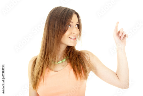 woman points finger at something in her left. Isolated on white