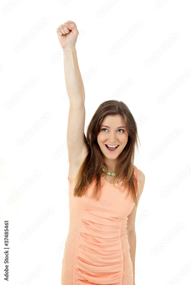 A portrait of a happy young woman with her hands up over white b A portrait of a happy young woman with her hands up over white b