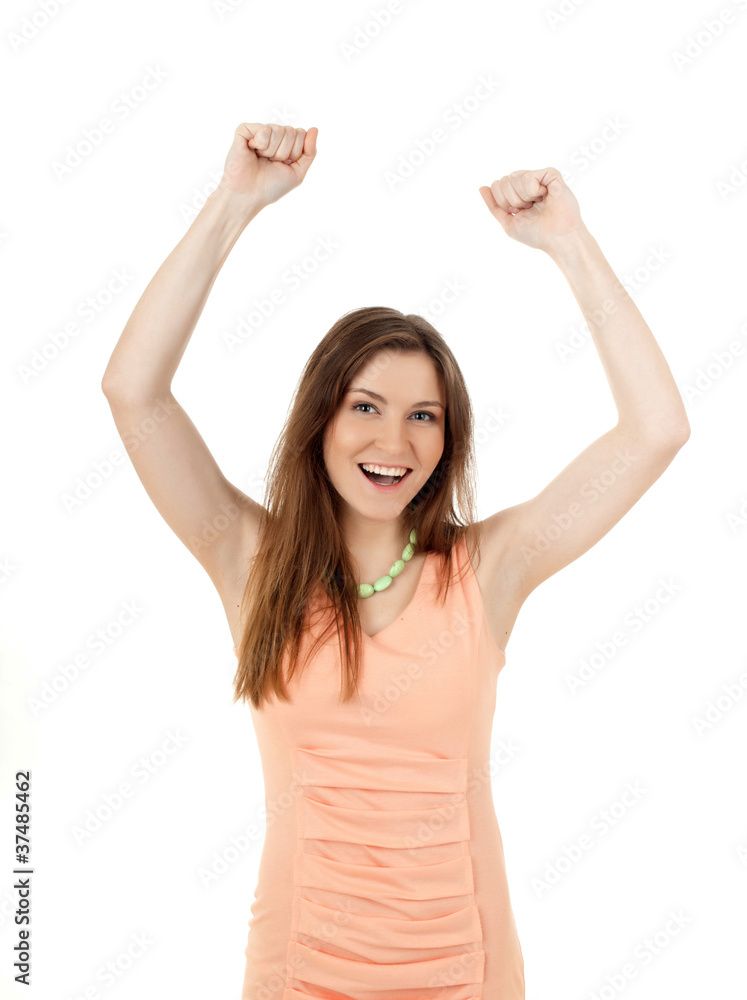 A portrait of a happy young woman with her hands up over white b A portrait of a happy young woman with her hands up over white b