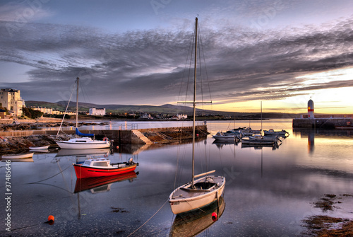 HDR - Boats in Harbour with Lighthouse photo