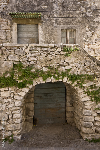 Fototapeta Naklejka Na Ścianę i Meble -  Old stony terrace with wine cellar