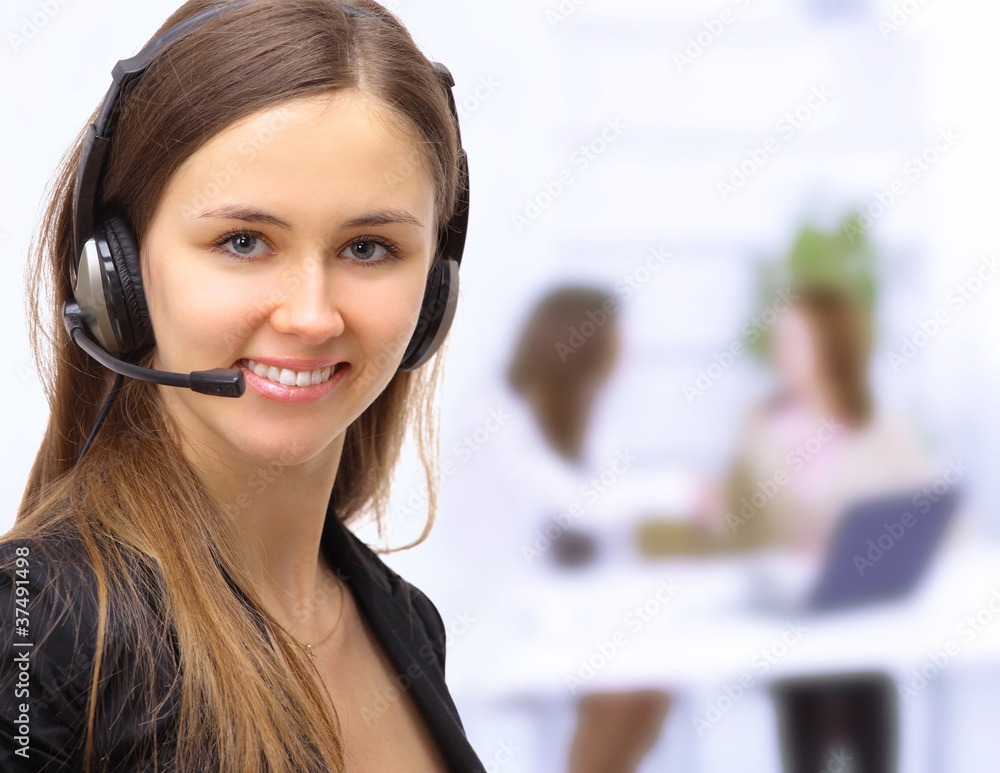 Beautiful woman operator in the office. Beautiful woman operator in the office.