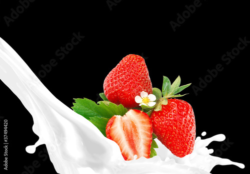 Splashing milk with strawberry