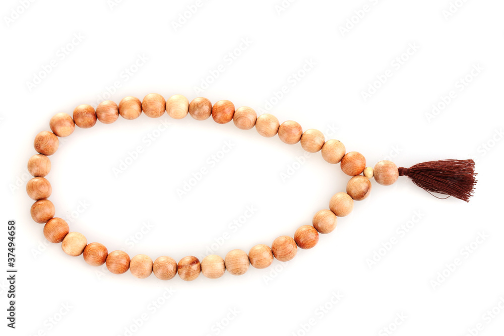 Obraz premium Wooden rosary isolated on white