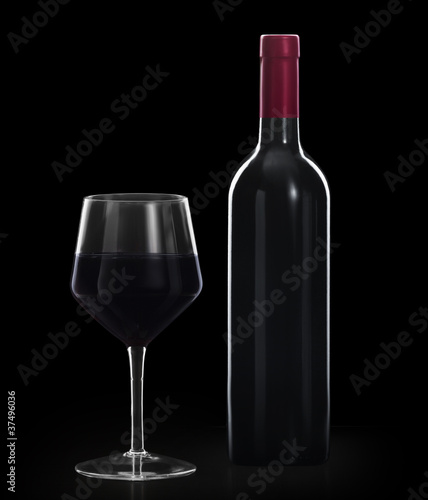 Glass of red wine and a bottle