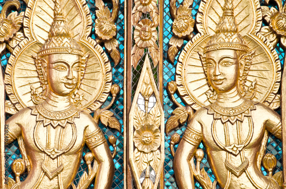 Thai textured gate at Wat Sirisaotong, Thailand