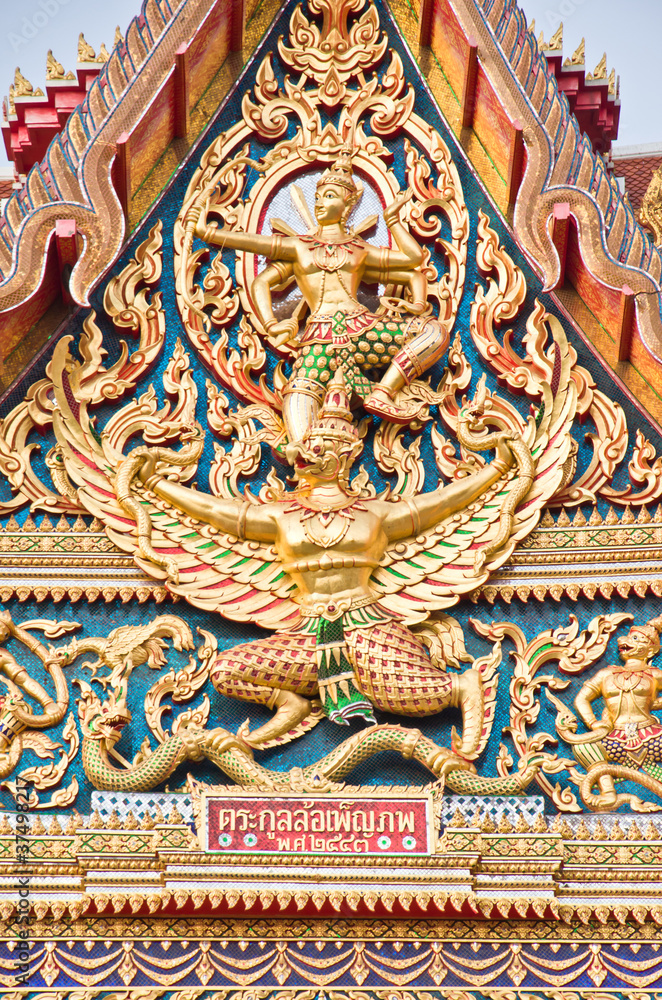 Narayana ride garuda sculpture textured at Wat Sirisaotong Narayana ride garuda sculpture textured at Wat Sirisaotong