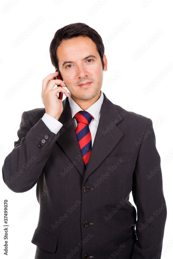 Young smiling businessman talking on mobile phone on white backg Young smiling businessman talking on mobile phone on white backg