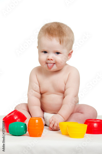 Cute little baby is playing...