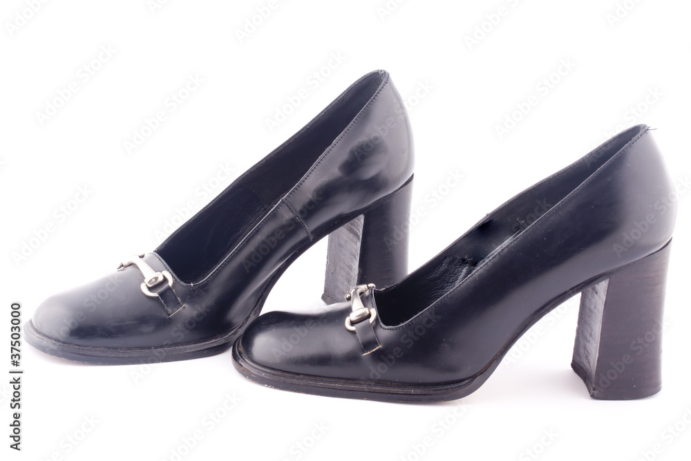 a pair of black heel shoes a pair of black heel shoes