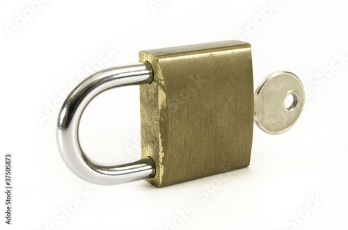 Padlock with key on white background