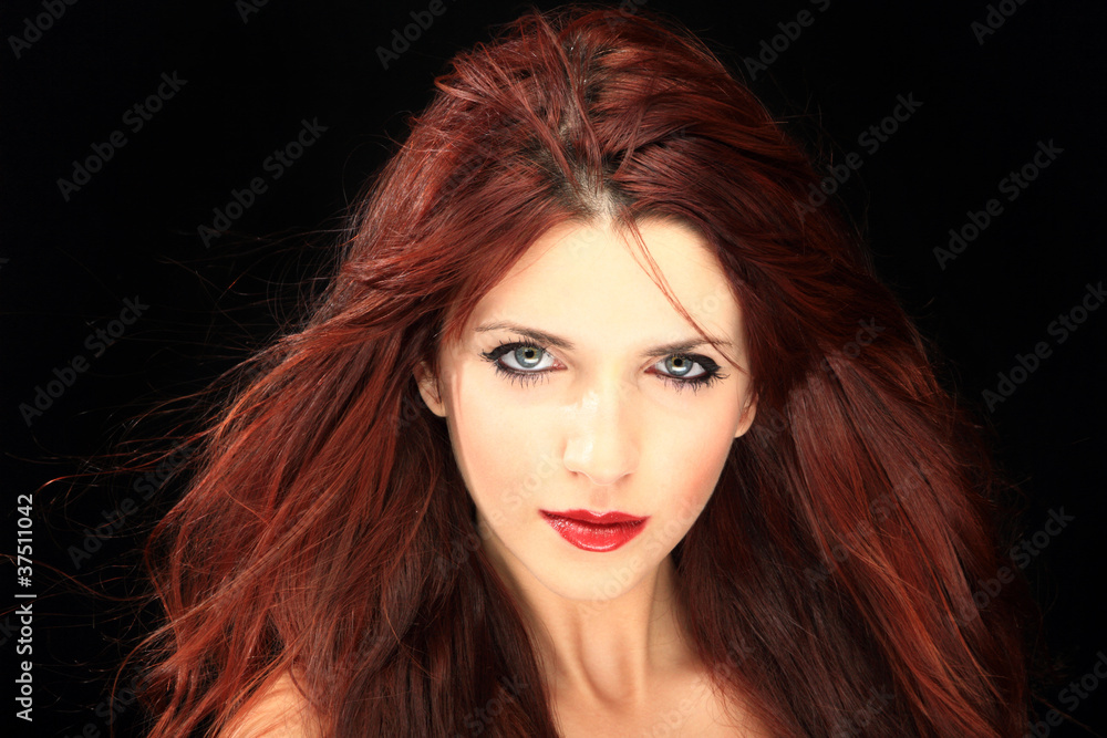 Glamour portrait of a woman on black Glamour portrait of a woman on black