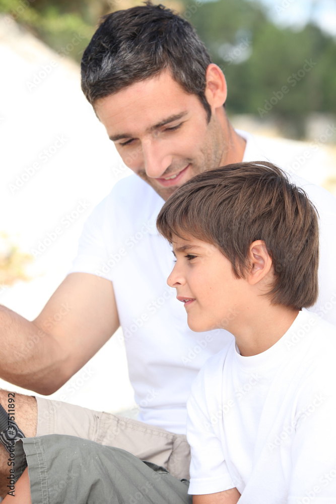 Father and son on a fishing trip. Father and son on a fishing trip.