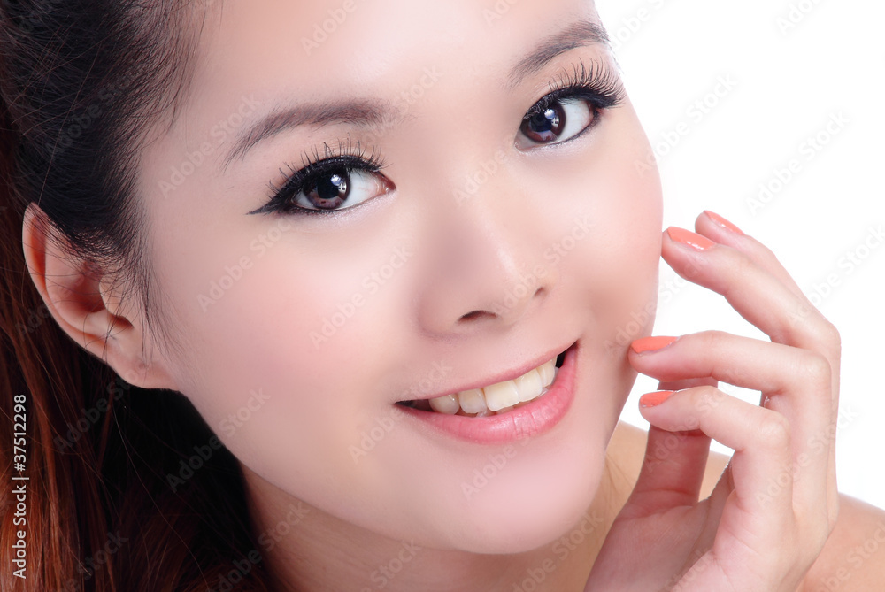 Asian beauty skin care woman touching her face and smiling Asian beauty skin care woman touching her face and smiling