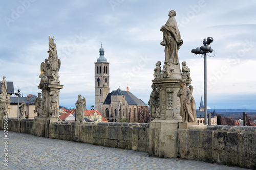Kutna Hora, sculptures and view on the Church of St. James photo