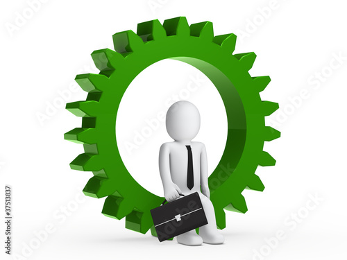 Businesman sitting in green...
