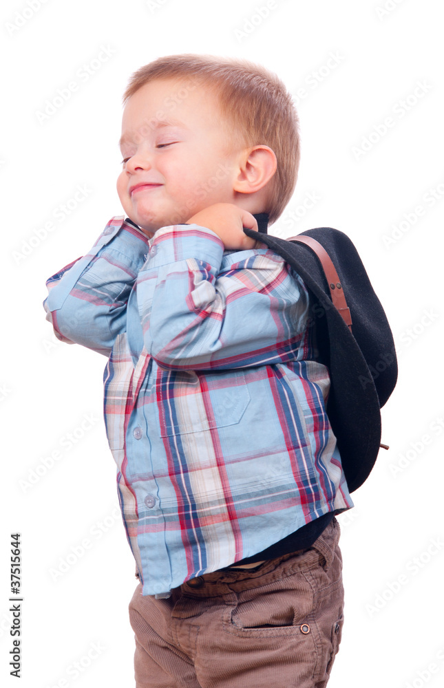 Pretty little boy smiles while holding cowboy hat Pretty little boy smiles while holding cowboy hat