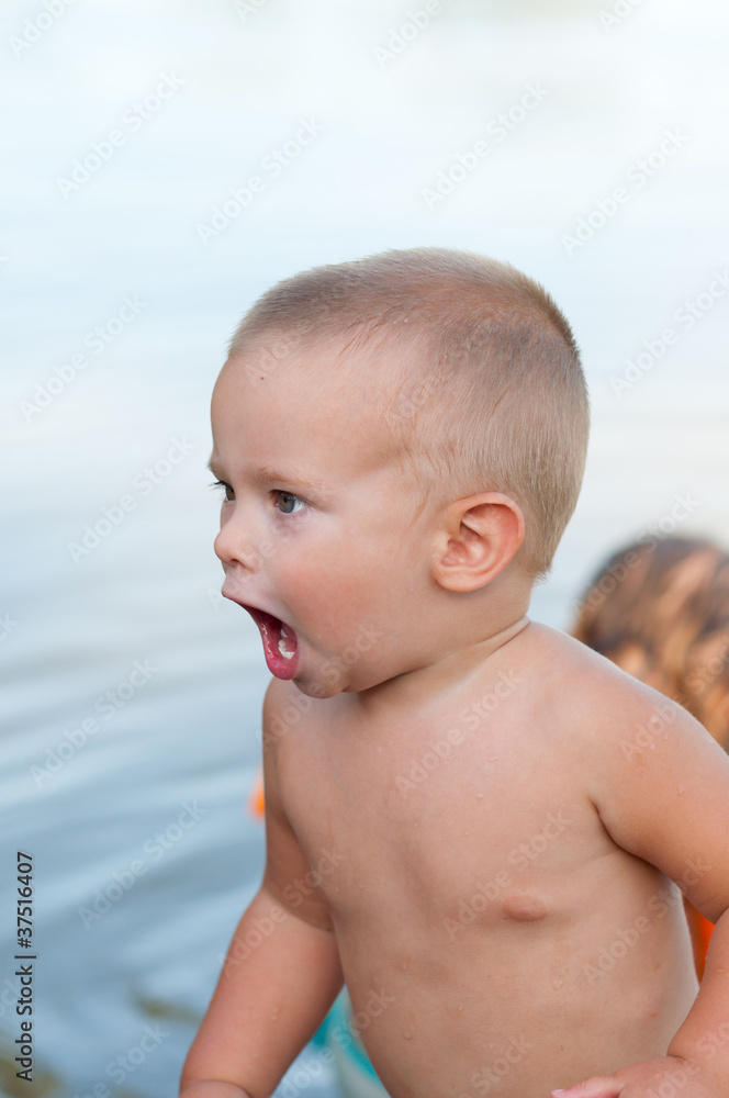 Cute little boy playing on the beach Cute little boy playing on the beach