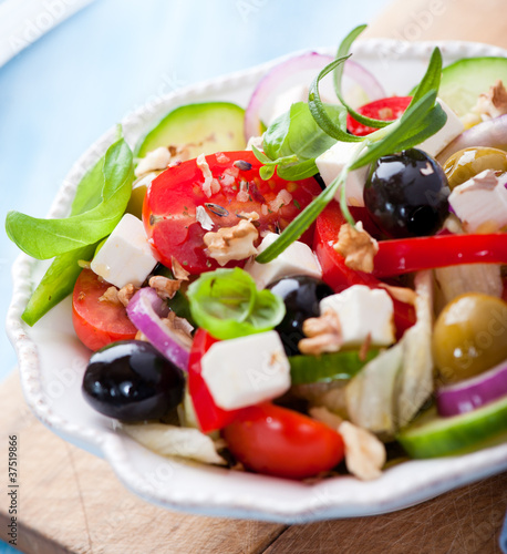 Mediterranean-style salad with feta and walnuts
